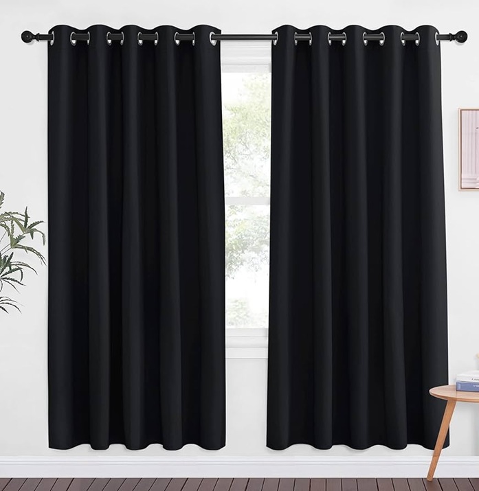 Blackout curtains blocking light for better sleep after 40